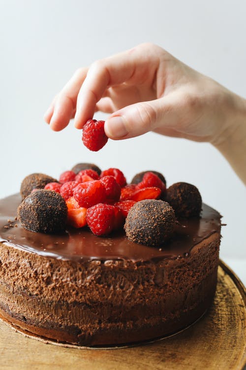 Photo Of Person Holding Raspberry 